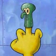 a cartoon hand with a green hat on it