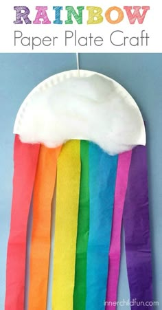 a paper plate craft with rainbow colors on it