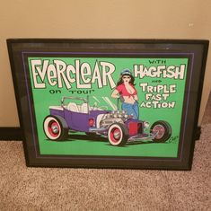 an old fashion advertisement for the everclear on tour, with a woman standing next to a purple car