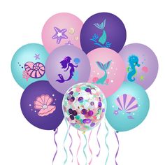 a bunch of balloons with mermaid designs on them