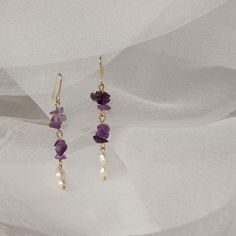 These Amethyst Rosemary Earrings are the perfect example of cottage-core elegance. Crafted with real freshwater pearls, these earrings will add a unique, luxurious touch to any outfit. 💎 Materials: 14k Gold Electroplated - more durable than regular platings Natural Quartz (Every piece will be different) Freshwater Pearls Elegant Amethyst Earrings With Pearl Drop, Elegant Amethyst Pearl Drop Earrings, Elegant Amethyst Earrings As A Gift, Pearl Earrings Handmade, Freshwater Pearl Drop Earrings, Purple Quartz, Freshwater Pearls Earrings, Beaded Drop Earrings, Amethyst Earrings