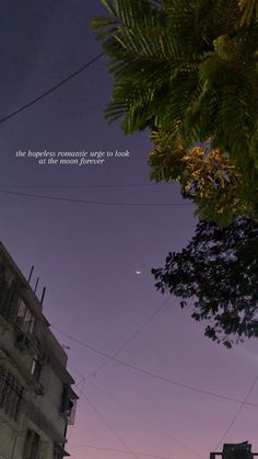 an image of the sky at night with trees in the foreground and a quote above it