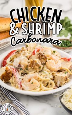 chicken and shrimp casserole in a white bowl on a marble table with pasta