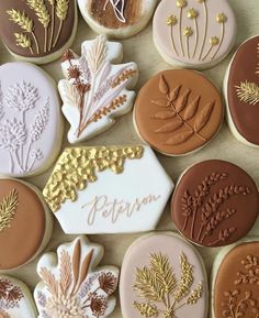 decorated cookies are arranged on a table