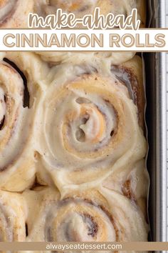 cinnamon rolls with icing in a pan on top of a white countertop and text overlay that reads make ahead cinnamon rolls