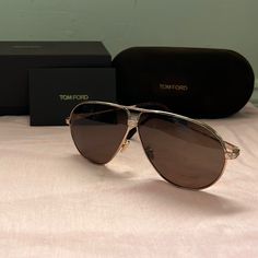 Authentic Tom Ford Jet Tf734-H 28e Frame 64-7-140 Aviator Gold Sunglasses Nwt Never Worn Classic Style Comes With Authentic Case And Cleaning Cloth. These Are Actually Rose Gold. Luxury Glass Aviator Sunglasses With Tinted Lenses, Luxury Glass Aviator Sunglasses With Mirrored Lenses, Luxury Tan Sunglasses With Mirrored Lenses, Elegant Brown Aviator Sunglasses, Luxury Polarized Aviator Sunglasses, Elegant Aviator Sunglasses With Glass Lenses, Elegant Aviator Sunglasses With Metal Frame For Formal Occasions, Elegant Glass Aviator Sunglasses, Elegant Rimless Aviator Sunglasses