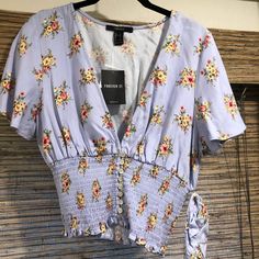 Forever 21 Blue Floral Top Comes With Matching Scrunchy. Condition: Brand New Forever 21 Blue Crop Top For Spring, Forever 21 Blue Summer Tops, Forever 21 Blue Cropped Tops, 21 Outfits, Forever 21 Outfits, Stretchy Crop Tops, Purple Crop Top, Linen Crop Top, Graphic Crop Top