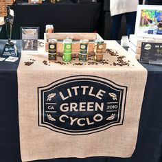 a table topped with lots of different types of food and drink bottles on top of it