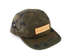 The highly coveted and sought after Louis Vuitton X Supreme Very Limited Edition Green Camouflage 5 panel Cap.Front Supreme leather plaque.Adjustable rear leather strap with buckle. Comes with LV gift box.NEW or NEVER WORN Military Style Snapback Hat With Flat Brim, Military Style 5-panel Baseball Cap For Streetwear, Adjustable Military 5-panel Snapback Hat, Adjustable Military Style 5-panel Snapback Hat, Military Style 5-panel Streetwear Hat, Military Style Adjustable Snapback Hat For Streetwear, Camouflage 5-panel Hat For Streetwear, Five Panel Cap, Louis Vuitton Men