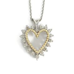 Vintage Two-Tone Diamond Heart Pendant Necklace 14K White Gold, 15.60 Grams This is a beautiful necklace. Please let us know if you have any questions :) Circa: 1980's Diamonds: 18 round single cuts, .20 ctw, I-J, SI2 Metal: 14K white gold Weight: 5.60 grams Stamped: 14K Length: 17.75 inches Pendant: 1 inch (with bale) x 21 mm Clasp: lobster White Gold Heart Cut Necklace Stamped 14k, Anniversary Diamond Cut Heart Necklace, Anniversary Heart Necklace With 17 Jewels, White Gold Heart Necklace With 17 Jewels For Anniversary, Diamond Cut Heart Pendant Necklace For Anniversary, Vintage White Gold Necklace For Valentine's Day, Vintage White Gold Necklaces For Valentine's Day, Anniversary Heart Pendant Diamond Necklace With 17 Jewels, Anniversary Heart Pendant Necklace With Diamond Cut