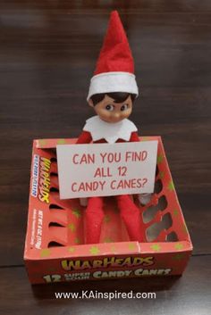 an elf is holding a candy cane box with the message can you find all 9 candy canes?