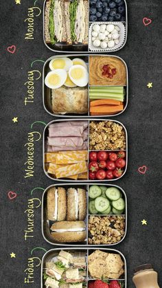 an open lunch box with sandwiches, fruits and vegetables in it on a chalkboard