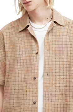 Small, neatly patterned perforations bring texture and breathability to a camp shirt cut from goatskin leather for a standout look at warm-weather occasions. 29" length; 46" chest (size Medium) Front button closure Convertible collar Short sleeves Leather Professional leather clean Imported Allsaints Camp Collar Top For Spring, Allsaints Casual Summer Shirt, Casual Allsaints Summer Shirt, Allsaints Short Sleeve Summer Shirt, Allsaints Collared Summer Shirt, Casual Leather Short Sleeve Tops, Casual Leather Top With Short Sleeves, Casual Leather Tops With Short Sleeves, Casual Short Sleeve Leather Top