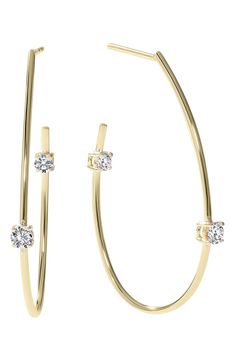 These diamond-detailed hoop earrings are elegantly shaped by a teardrop silhouette. 1 3/8" drop; 1/8" width Clear rubber backs included for stability Total diamond weight: 0.26ct. Color: G–H Clarity: SI 14k gold/diamond Imported >Diamond Guide Teardrop Diamond Hoop Earrings With Accents, Formal Yellow Gold Pear-shaped Hoop Earrings, Modern Small Hoop Jewelry With Diamond Accents, Luxury Hoop Earrings With Ear Wire, Luxury Teardrop Pierced Hoop Earrings, Diamond Pierced Hoop Earrings, Elegant Small Hoop Single Diamond Earring, Formal Pierced Diamond Hoop Earrings, Formal Diamond Hoop Earrings Pierced