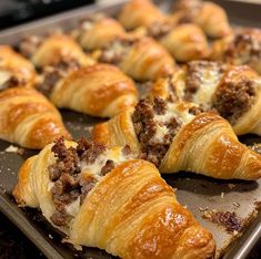 there are many pastries on the baking sheet