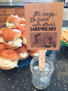 a sign that says it's easy we finish each other's sandwiches on a stick