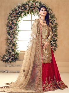 Gleamed | Pakistani Designer Outfit | Sarosh Salman Gold Saree Dress With Mirror Work, Gold Dress With Mirror Work For Festive Occasions, Festive Gold Dress With Mirror Work, Gold Unstitched Designer Wear Sets, Unstitched Gold Embroidery Sharara For Festive Occasions, Designer Gold Zari Work Sets, Gold Embellished Saree Dress, Unstitched Festive Sharara With Gold Embroidery, Unstitched Sharara With Gold Embroidery For Festive Occasions