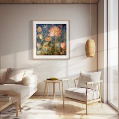 a living room filled with furniture and a painting hanging on the wall over a coffee table