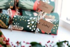 several wrapped presents sitting on top of a table