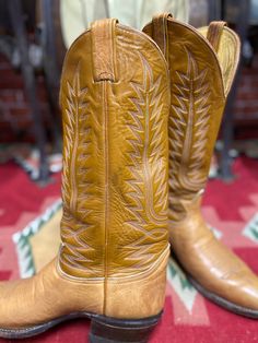 "Vintage Tony Lama western stitching cowboy boots size 9EE, style #6530, two tone brown color, stitch pattern resembling the wings of the phoenix. Good used condition, some wear, minor scuffing on the pointed toes, made in Usa. Please, check carefully the measurements, photos and description of the article before buying it, we do not accept changes or returns. Outsole Approximate Dimensions: 11 1/2\" long heel to toe. 10 3/4\" Inside from the heel to the toe. 4\" Widest wide in front of footwear Brown Concho Boots For Rodeo, Fitted Vintage Brown Western Boots, Brown Concho Boots For Western-themed Events, Southwestern Brown Snip Toe Boots, Hand Tooled Brown Boots For Western-themed Events, Brown Southwestern Snip Toe Boots, Brown Fitted Western Boots, Fitted Brown Western Boots, Brown Hand Tooled Boots For Western-themed Events