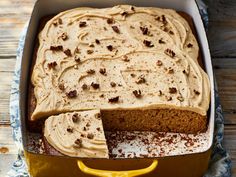 a cake in a pan with a slice cut out