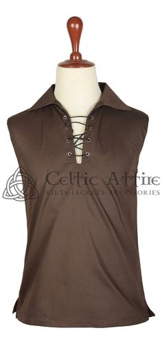 This Modern Sleeveless Ghillie Shirt is the perfect choice for traditional or utility kilts this summer. Offering Traditional Style and Freedom of Modern Vests, this Shirt can be used with almost any attire, Scottish, Medieval or Casual Jeans even. - Made of Cotton Fabric - Regular Fit - Comes with Real Leather Lace - Metal Eyelets - Single Needle Premium Stitch - Available through Size Small to 6XL and in 6 Different Colors Brown Cotton V-neck Shirt, Sleeveless Brown Cotton Blouse, Brown Sleeveless Cotton Blouse, Sleeveless Brown Cotton Top, Brown Sleeveless Cotton Top, Classic Brown Vest Top, Fitted Brown Sleeveless Blouse, Fitted Sleeveless Brown Blouse, Utility Kilt