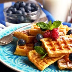 waffles with blueberries and raspberries on a plate