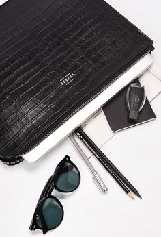 Carry your business essentials in style with our Monaco Croco Large Folio. Smart and compact, with space to hold a 15” laptop, an iPad, notebooks & papers. Handcrafted in our Crocodile Embossed leather, this rigid structure large folio was made to last a lifetime. Designed with wide zip-around opening for easy access, this pouch is sure to become a workwear staple. Dimensions- Height 10.6" - Length 14.2" - Width 1.2" Elegant Travel Cases With Laptop Sleeve, Rectangular Workwear Cases With Laptop Sleeve, Classic Laptop Bag With Sleeve For Business Meetings, Modern Laptop Bag With Sleeve For Business, Modern Laptop Bag With Sleeve For Business Meetings, Modern Formal Laptop Sleeve Case, Elegant Formal Laptop Sleeve Case, Black Rectangular Office Case, Elegant Leather Case With Laptop Sleeve