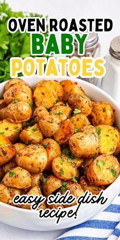 oven roasted baby potatoes in a white bowl on a blue and white striped tablecloth