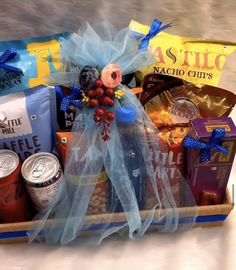 a basket filled with coffee and snacks