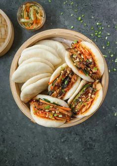 an overhead view of some food in a bowl with chopsticks on the side