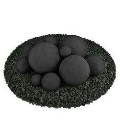 some black rocks and grass on a white background