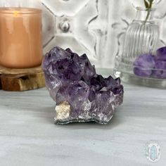 This mesmerizing Brazilian purple Amethyst is a true gemstone that boasts a rich violet hue accompanied by facets that sparkle in the light. The golden goethite inclusions within this gem create a unique, enchanting pattern. Approximate Size:L: 3.40" x W: 3.00" x H: 2.90"Approximate Weight:1.10 lbs. We make and carry many unique and one-of-a-kind items made of materials from around the world. Some may come with imperfections because they're natural. Appearances of cracks and chips aren't due to Faceted Amethyst Spiritual Gemstone, Mystical Purple Crystals With Natural Stones, Mystical Purple Natural Stone Crystals, Lavender Gemstone Crystals For Spiritual Use, Mystical Natural Purple Crystals, Spiritual Lavender Gemstone Crystals, Spiritual Lavender Crystals, Purple Amethyst Gemstone Crystals, Lavender Amethyst Geodes For Spiritual Use