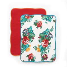 two square coasters with red and green flowers on them, one in the shape of a rectangle