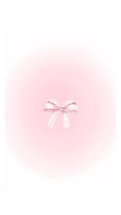 a white bow on a pink background