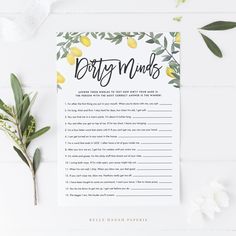 a printable wedding game with lemons and greenery on the table next to it