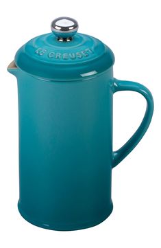 a teal colored french press coffee pot with the words get 10 % off in rue credit