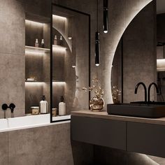 a bathroom with a sink, mirror and bathtub in the middle is lit by recessed lights