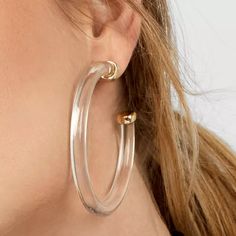 Looking for the perfect earrings to compliment every outfit? These hoops are the answer! Featuring a transparent design with gold detail, these are the perfect accessory to complete any look and stand out! Available in Clear and Grey Lightweight (16g) Clear Hoop Earrings, Modern Clear Hoop Earrings For Pierced Ears, Modern Clear Hoop Earrings, Trendy Clear Hoop Earrings, Trendy Clear Hoop Earrings As Gift, Clear Hoop Earrings For Party, Trendy Clear Hoop Earrings, Perfect As Gift, Trendy Small Hoop Clear Jewelry, Trendy Clear Hoop Earrings For Parties