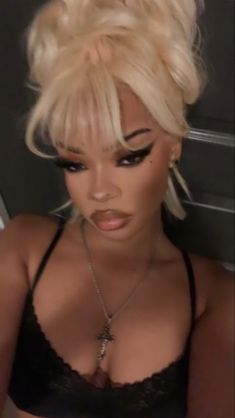 Blonde Updo Black Women Prom, Pamela Anderson Hair Black Women, Blonde Bang Wig Black Women, Blonde Updo With Bangs, Blonde Bun Black Women, Blonde Wig With Bangs Black Women, Marylin Monroe Hairstyle Black Women, Pamela Anderson 90s Hair, Blonde Updo Wig