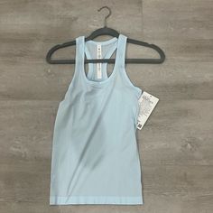 Blue, New With Tags, Swiftly Tank, Size 2 Functional Blue Tank Top For Workout, Blue Medium Support Tank Top For Gym, Supportive Blue Gym Tank Top, Blue Tank Top For Light Exercise In Summer, Blue Tank Top For Summer Exercise, Functional Blue Top For Spring, Light Blue Fitted Tank Top For Workout, Functional Blue Spring Top, Light Blue Fitted Workout Tank Top