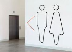 an image of two people standing next to each other on the wall with arrows pointing in opposite directions