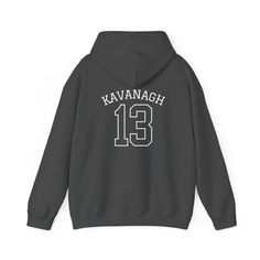 Boys of Tommen Hoodie #13 - Johnny Kavanagh Edition Gear up like a true Boys of Tommen with this limited-edition Hoodie #13, dedicated to fan-favorite Johnny Kavanagh! Perfect for any fan of the Boys of Tommen rugby team, this cozy hoodie combines comfort, style, and team spirit in one. Crafted from high-quality, soft cotton-blend fabric, this hoodie is perfect for everyday wear, whether you're at the rugby pitch, lounging at home, or out with friends. The number 13 on the back pays homage to Jo Sporty Hooded Fan Merchandise Hoodie, Hooded Sports Fan Hoodie For Streetwear, Throwback Hoodie For Sports Season Fan Merchandise, Fan Apparel Hoodie With Team Logo, Sports Fan Apparel Hoodie, Sports Fan Hoodie For Streetwear, Fan Merchandise Hooded Hoodie, Fan Merchandise Hoodie With Team Name, Winter Fan Apparel Hoodie