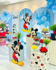 mickey mouse themed birthday party with balloons and decorations