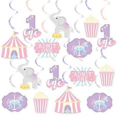 an elephant themed birthday party decorationating kit with cupcakes and circus tent decorations