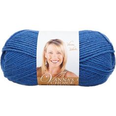 blue yarn ball with an image of a smiling woman