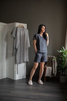 "Pyjama set: shorts + t-shirt. This sporty and casual set is crafted from soft-washed linen and will provide you with exceptional comfort night and day. You can wear top and bottom together as pyjama set at your home or separately as shorts and T-shirt mixing and matching them with other pieces of your clothing for a street look.  Shorts feature an elasticated drawstring to tighten your waist, side pockets. The minimalistic top is styled with a V neckline, short sleeves, and a relaxed fit. The model is with charcoal grey color pyjama.  SIZE CHART:  XS-4 US/ 6UK/ 36 EU: Bust 33\" (84 cm) , Waist 25\" (63,5 cm), Hips 36,2\" (92 cm)  S-6 US/ 8UK/ 38 EU: Bust 34,6\" (88 cm) , Waist 26,6\" (67,5 cm), Hips 37,8\" (96 cm) M-8 US/ 10UK/ 40 EU: Bust 36,2\" (92 cm), Waist 28,3\" (72 cm), Hips 39,4\" Comfortable Relaxed Fit Summer Sets, Casual Home Sets For Summer, Casual Summer Home Sets, Summer Relaxed Fit Pajama Shorts For Home, Relaxed Fit Sets For Summer Relaxation, Comfortable Relaxed Fit Short Sleeve Sets, Casual Short Sleepwear For Home, Relaxed Fit Short Sleeve Sets, Linen Shorts For Loungewear