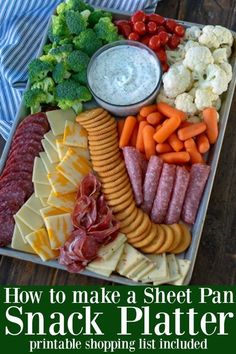 a platter filled with meat, cheese and veggies