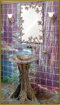 a bathroom with a tree stump sink and wall tiles in the back ground, along with a mirror on the wall