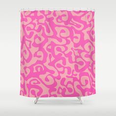 a pink shower curtain with an animal print